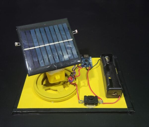 Fully assembled solar tracker without Arduino, featuring an LDR sensor, DC motor, and a battery-powered system for automatic sun tracking in science projects.